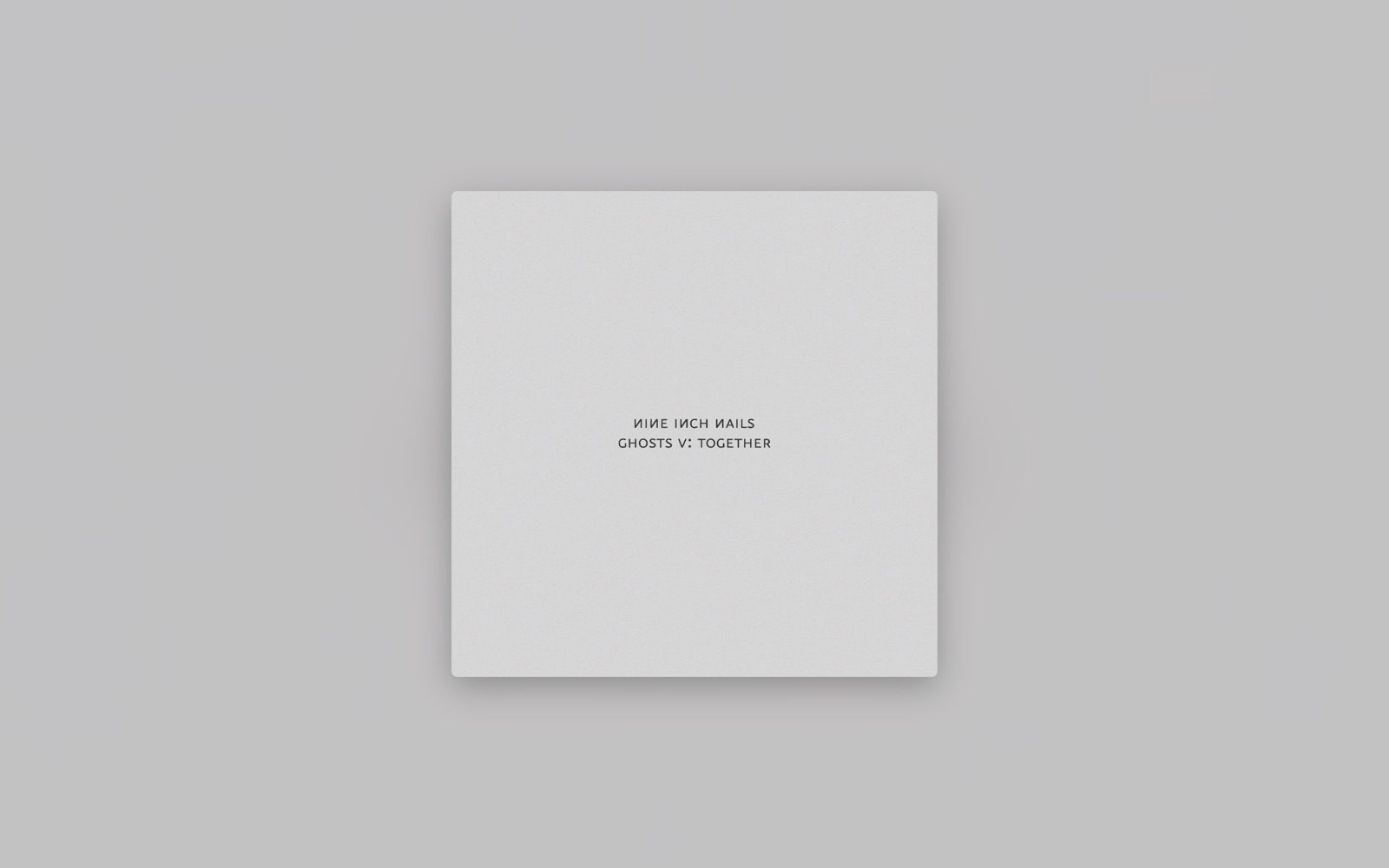 A wallpaper showing the pale grey album cover of Nine Inch Nails' Ghosts V: Together, centred over a soft wash of its own colour.