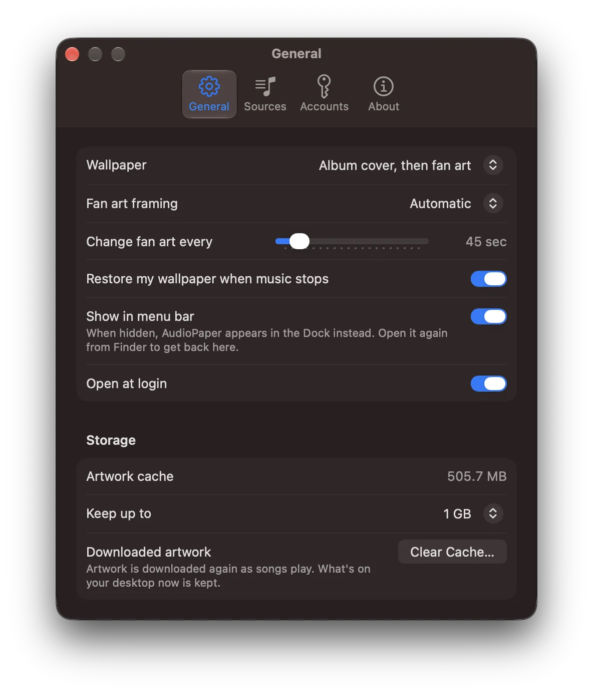 Settings, General pane: Wallpaper set to Album cover, then fan art; Fan art framing Automatic; Change fan art every 45 seconds; switches for restoring the wallpaper when music stops, showing in the menu bar and opening at login; and the Storage section with the artwork cache size, a Keep up to menu and Clear Cache.